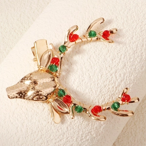 Christmas reindeer hair clip with red and green crystal beads on gold plated metal