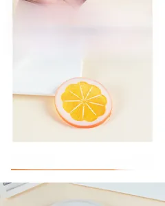 Macro detail of artificial orange PVC lemon slices with realistic texture and fibers