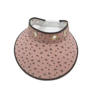 Women's pink open top sun hat with black butterfly pattern and breathable metal eyelets