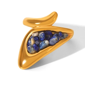 Detail of vintage gold stainless steel ring with crushed blue lapis lazuli stone inlay