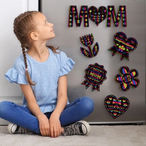 DIY Mother's Day rainbow scratch art magnets set showing a girl decorating a fridge