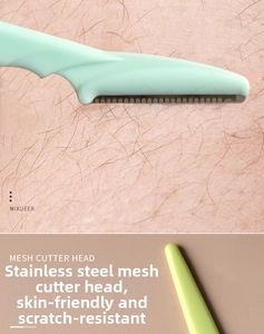 Macro view of mesh cutter head and stainless steel facial razor for precise grooming