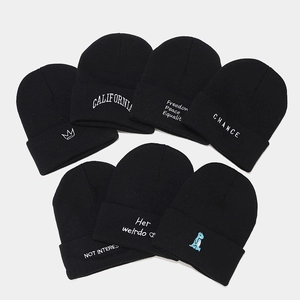 Fashionable black embroidered knit beanies with assorted urban street style patterns