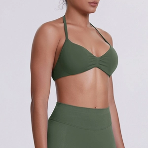 Detail of olive green seamless halter sports bra and high waisted yoga leggings set
