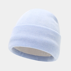 Close-up of thick fleece lining inside the light blue knitted beanie for winter warmth