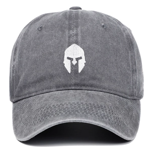 Detail of white Spartan helmet embroidery on a vintage grey washed cotton baseball cap