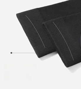Detail of high-elasticity widened ribbed cuffs on black chicken claw long socks