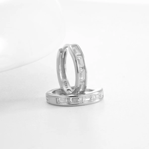 S925 sterling silver huggie hoop earrings featuring baguette-cut cubic zirconia inlays