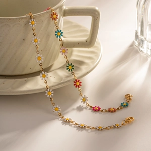 Ethnic gold chain necklace with colorful enamel daisy flowers and lobster clasp detail