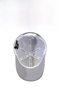 Detail view of the breathable mesh lining and interior sweatband of the baseball cap