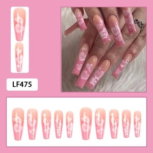 Pink gradient long press-on nails with white heart and star patterns, model LF475