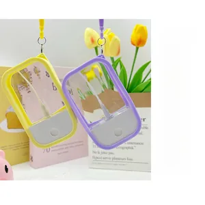 Detail of portable spray bottles with silicone protective cases and metal keychains