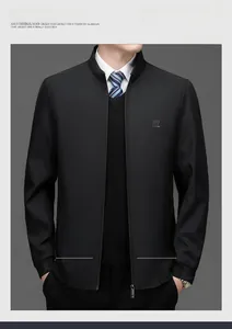 Detail of windproof stand collar with zipper and ribbed cuffs on black jacket