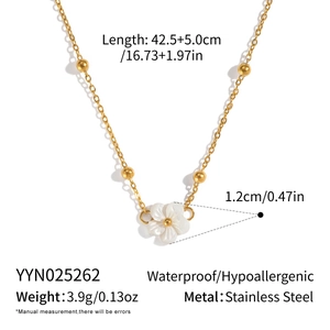 Detail showing 18K gold plated stainless steel necklace specs with shell flower pendant