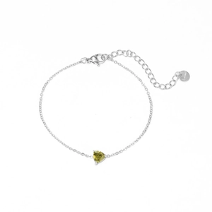 Minimalist silver stainless steel bracelet featuring a heart-shaped yellow gemstone charm