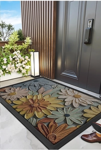 Detailed close-up of a floral entryway mat featuring durable anti-slip woven texture