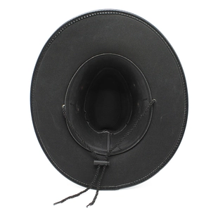 Detail of black western cowboy hat featuring adjustable windproof cord and wide brim