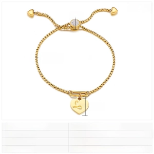 Detail view of gold heart pendant with Love engraving and adjustable slider measurements
