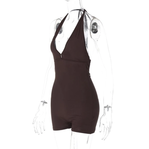 Side view of backless halter neck jumpsuit with ruched details in dark brown