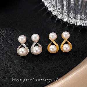 Elegant S925 sterling silver crisscross pearl stud earrings in gold and silver finish