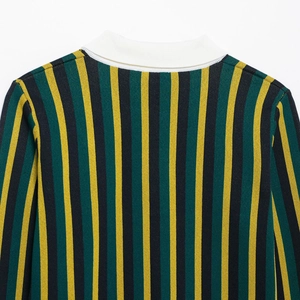 Vertical striped polo knit top with yellow, green and black patterns and white collar