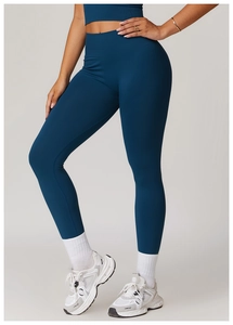 Detail of high waisted seamless yoga leggings with ribbed waistband and compression fabric