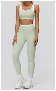 Detail des hellgrünen Yoga-Sets mit weißem Bund und hochdehnbarem Material für Fitness