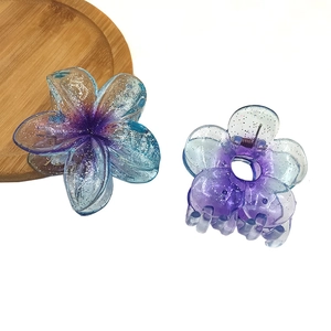 Sparkling gradient purple plumeria flower hair claw clip with silver glitter accents