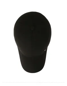 Top view of black winter baseball cap showing textured fabric and small metal side badge