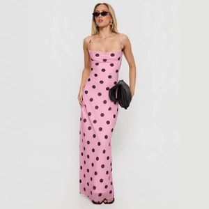 Pink polka dot bodycon maxi dress with spaghetti straps and back lace-up detail