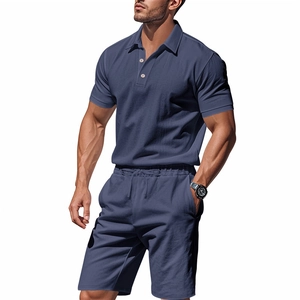 Close-up of navy blue waffle knit texture on men's breathable linen polo and shorts set