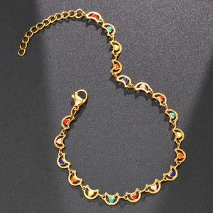 Macro shot of stainless steel bracelet with colorful enamel hearts and lobster clasp