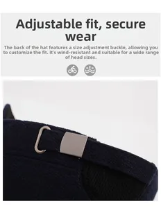 Detail of adjustable buckle on dark blue winter flat cap for men with knitted texture