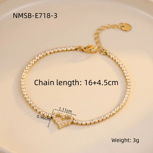Detail view of 18K gold plated stainless steel heart tennis bracelet with dimensions