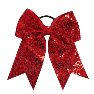 8 inch large red sequin bow hair tie with streamers and black elastic rubber band