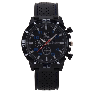 Men's sports watch with black silicone strap and three-eye dial featuring blue stitching