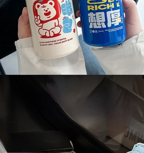 Detail view of dual-drink vacuum flask with cute cartoon bear motifs and social slogans