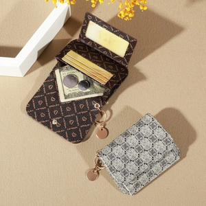 Detail of floral and geometric print PU leather wallets with multiple card slots and coin pocket