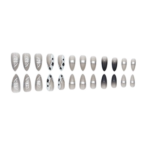 24pcs long almond press-on nails with butterfly motifs and black white cow prints