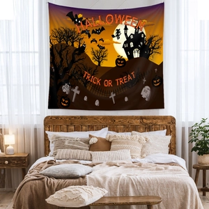 Detail of Halloween tapestry with pumpkin and castle graphics on polyester fabric