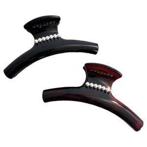 Elegant Korean style pearl hair claws in black and amber resin with glossy finish