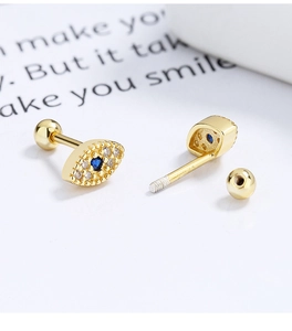 Detail of 925 silver evil eye stud earring with blue zircon and ball screw back closure