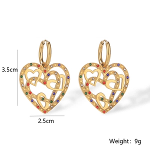 Detail view of gold-plated hollow heart earrings with dimensions 3.5cm and weight 9g