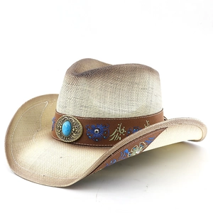 Chapeau de cowboy en paille avec boucle turquoise et broderie florale sur fond beige