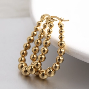 23mm stainless steel 18k gold-plated U-shaped earrings with graduated metal beads