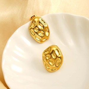 18k gold plated stainless steel earrings with irregular hammered texture on shell tray