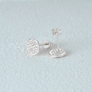 Detailed view of S925 sterling silver earrings with micro-pave white cubic zirconia stones