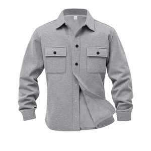 Detail of grey fleece-lined shirt jacket showing plush inner lining and chest pockets