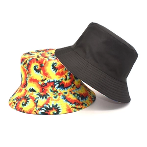 3D tie-dye and plain black reversible bucket hat featuring vibrant patterns for sun protection