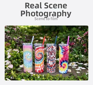 Outdoor shot of tie-dye stainless steel skinny tumblers with straws on a grassy field